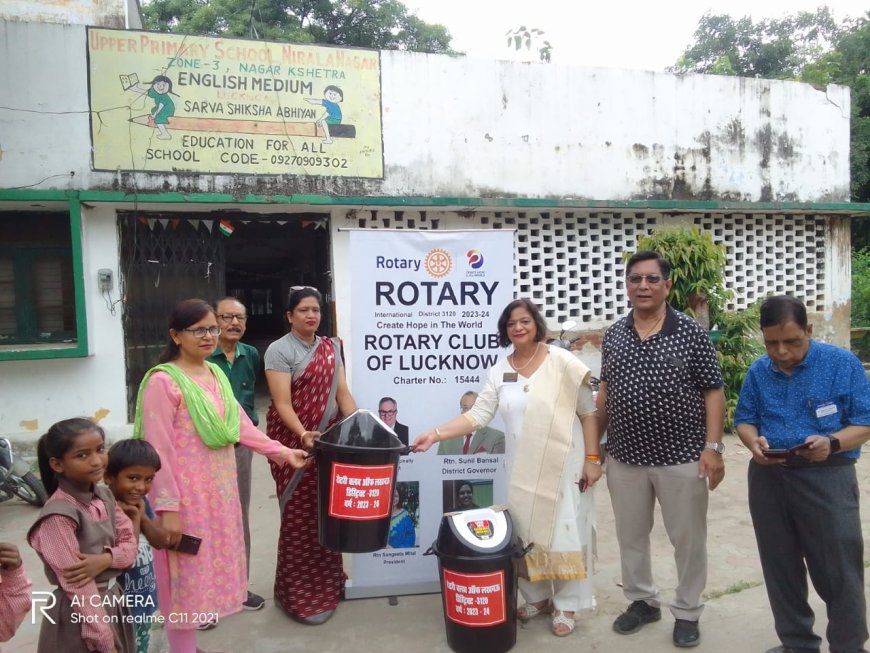 Rotary Club - dustbins were given  Happy School