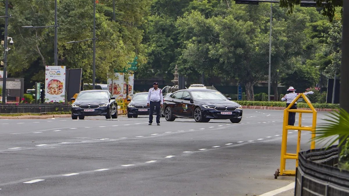 Delhi Traffic Police officials on duty receive AC-equipped helmets and fans to tackle heat