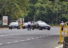 Delhi Traffic Police officials on duty receive AC-equipped helmets and fans to tackle heat